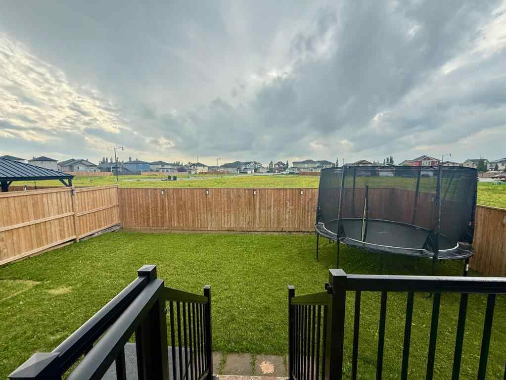 MLS® A2244117 - 864 Hampshire Crescent NE in Hampton Hills High River, Residential