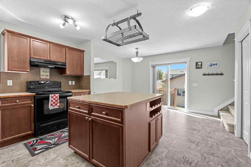 MLS® A2244141 - 89 Crystal Shores Heights  in Crystal Shores Okotoks, Residential