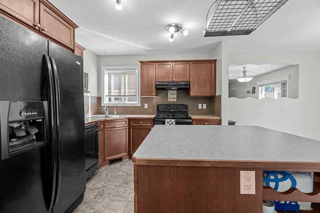 MLS® A2244141 - 89 Crystal Shores Heights  in Crystal Shores Okotoks, Residential