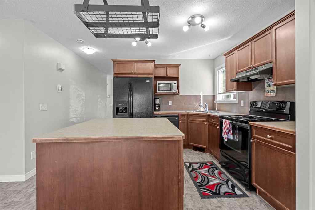 MLS® A2244141 - 89 Crystal Shores Heights  in Crystal Shores Okotoks, Residential