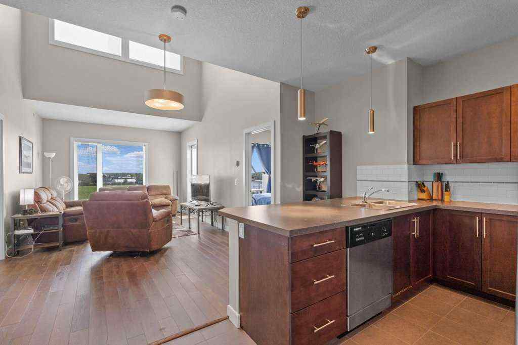 MLS® A2244217 - Unit #2418 604 East Lake Boulevard NE in East Lake Industrial Airdrie, Residential