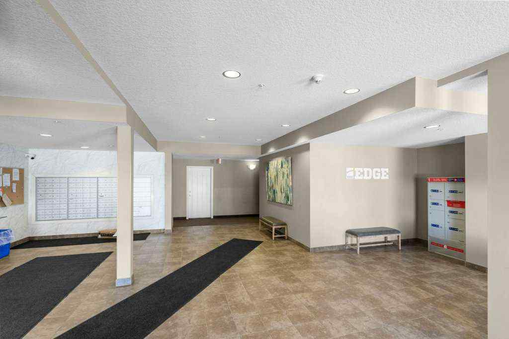MLS® A2244217 - Unit #2418 604 East Lake Boulevard NE in East Lake Industrial Airdrie, Residential