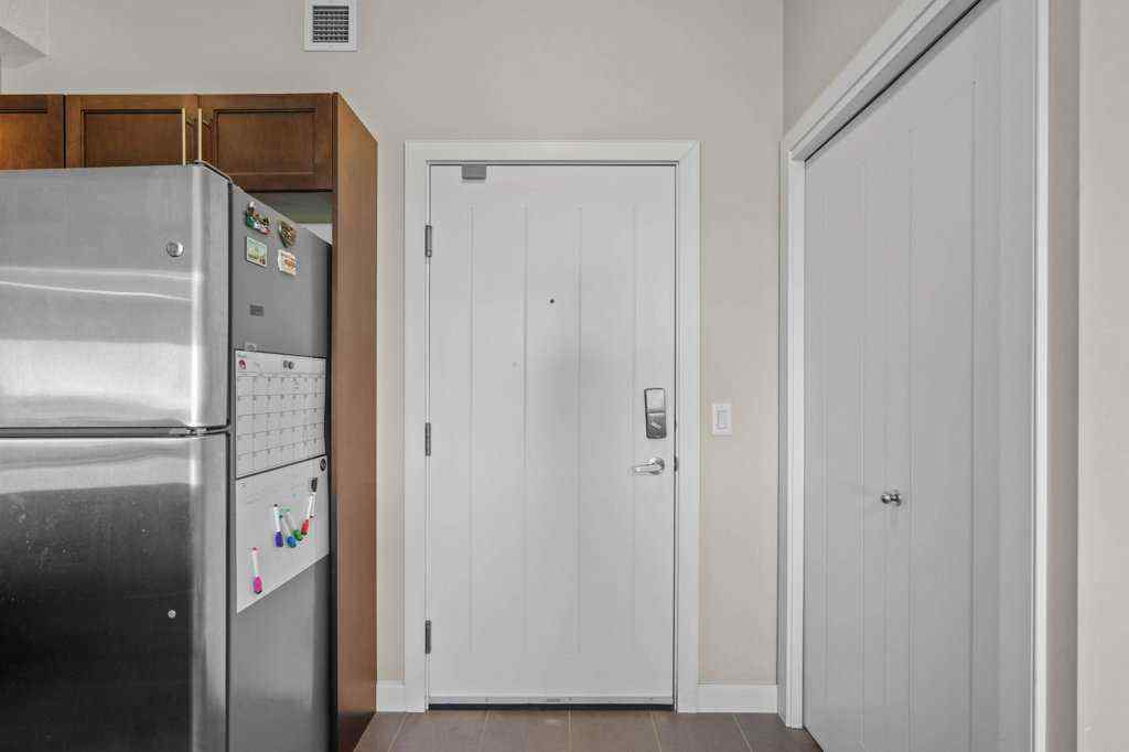 MLS® A2244217 - Unit #2418 604 East Lake Boulevard NE in East Lake Industrial Airdrie, Residential