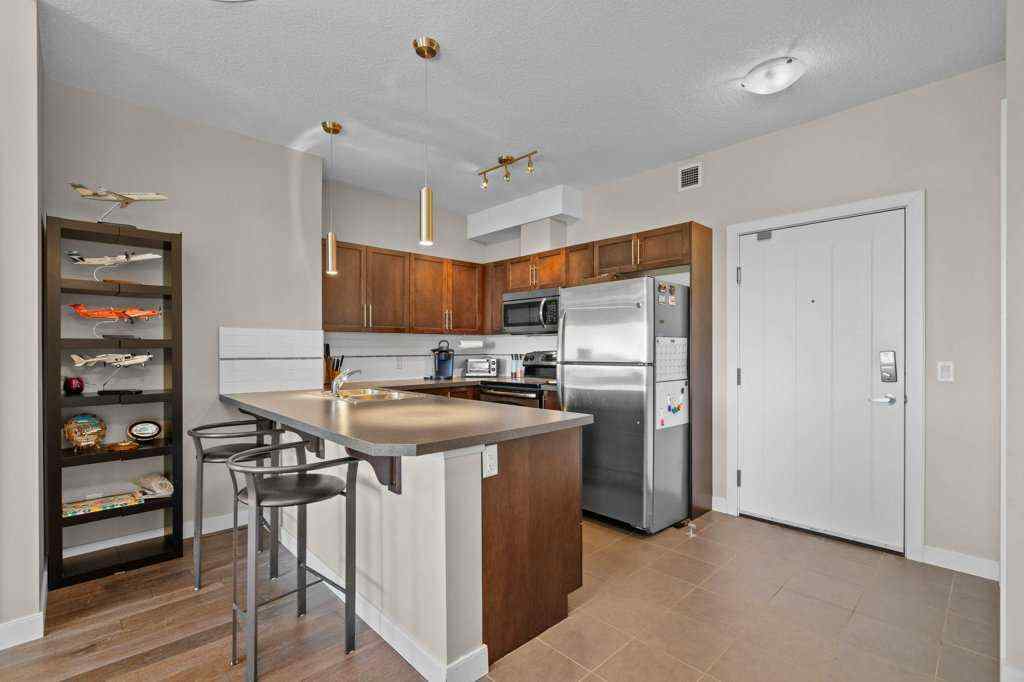 MLS® A2244217 - Unit #2418 604 East Lake Boulevard NE in East Lake Industrial Airdrie, Residential