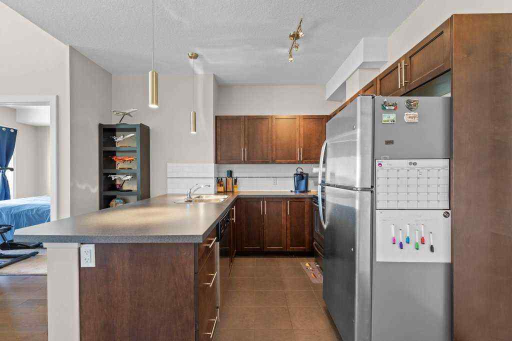 MLS® A2244217 - Unit #2418 604 East Lake Boulevard NE in East Lake Industrial Airdrie, Residential