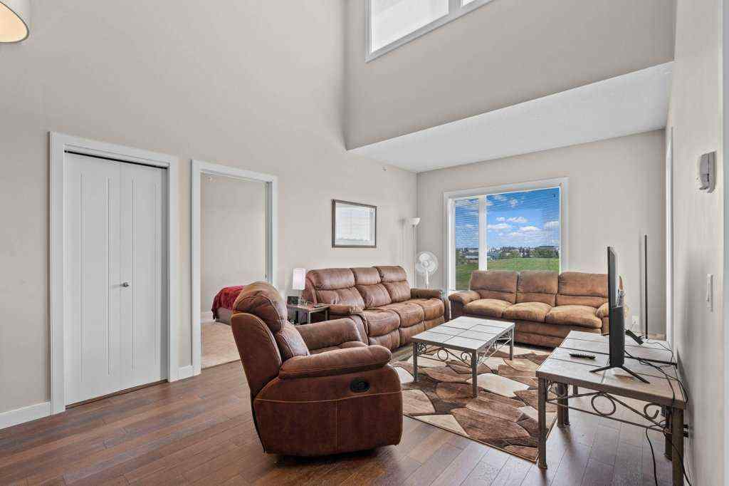 MLS® A2244217 - Unit #2418 604 East Lake Boulevard NE in East Lake Industrial Airdrie, Residential