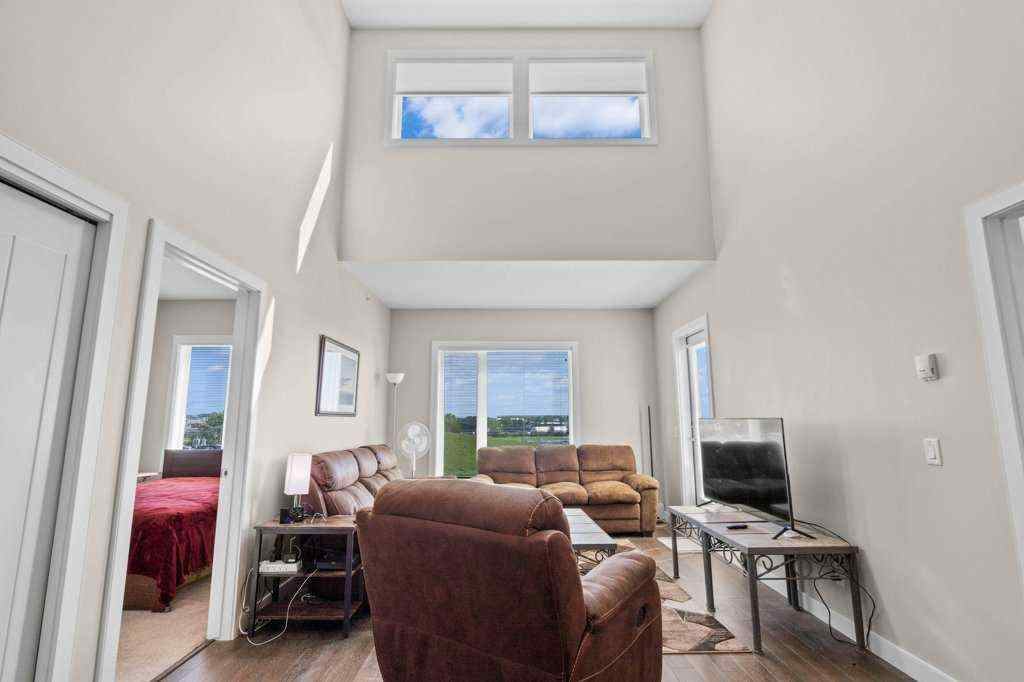MLS® A2244217 - Unit #2418 604 East Lake Boulevard NE in East Lake Industrial Airdrie, Residential