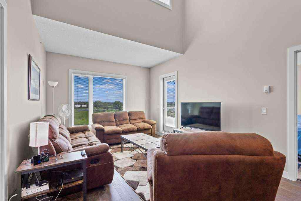 MLS® A2244217 - Unit #2418 604 East Lake Boulevard NE in East Lake Industrial Airdrie, Residential