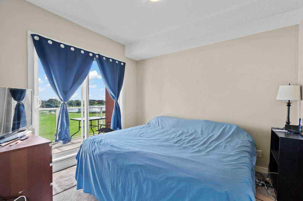 MLS® A2244217 - Unit #2418 604 East Lake Boulevard NE in East Lake Industrial Airdrie, Residential