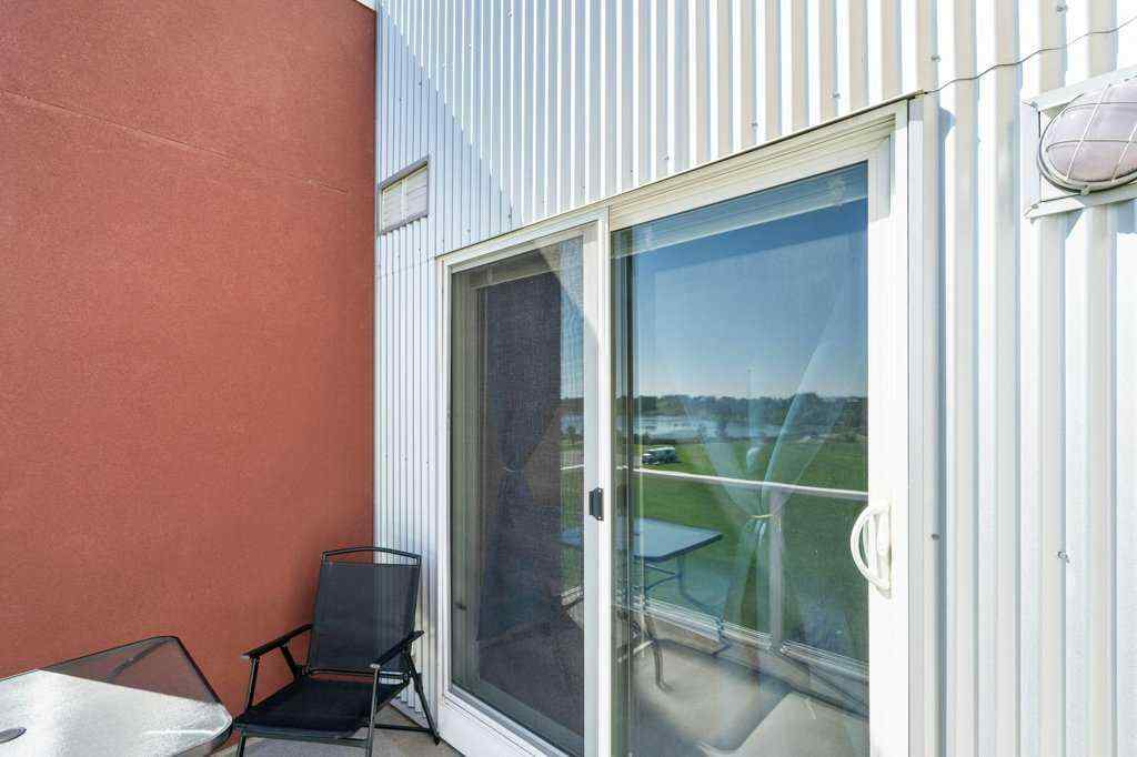 MLS® A2244217 - Unit #2418 604 East Lake Boulevard NE in East Lake Industrial Airdrie, Residential