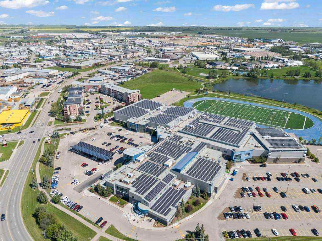 MLS® A2244217 - Unit #2418 604 East Lake Boulevard NE in East Lake Industrial Airdrie, Residential