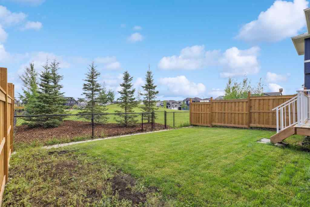 MLS® A2244221 - 335 Creekside Way SW in Pine Creek Calgary, Residential