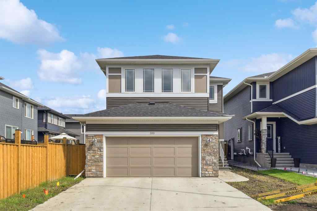 MLS® A2244221 - 335 Creekside Way SW in Pine Creek Calgary, Residential