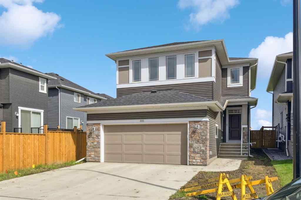 MLS® A2244221 - 335 Creekside Way SW in Pine Creek Calgary, Residential