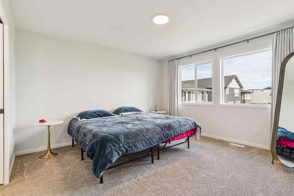 MLS® A2244221 - 335 Creekside Way SW in Pine Creek Calgary, Residential