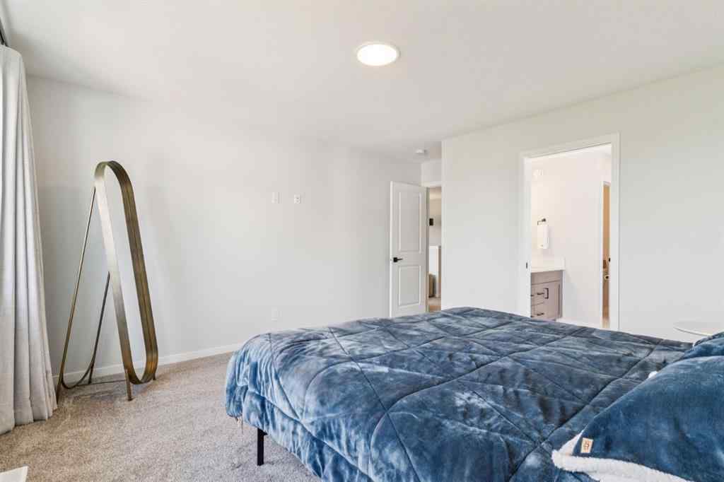 MLS® A2244221 - 335 Creekside Way SW in Pine Creek Calgary, Residential