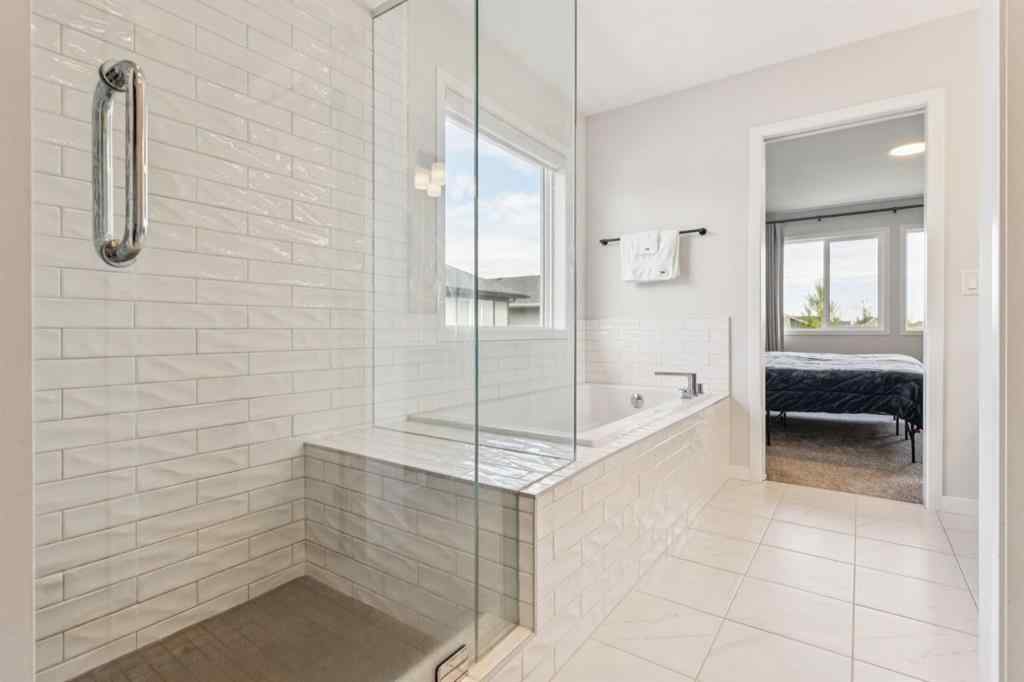 MLS® A2244221 - 335 Creekside Way SW in Pine Creek Calgary, Residential