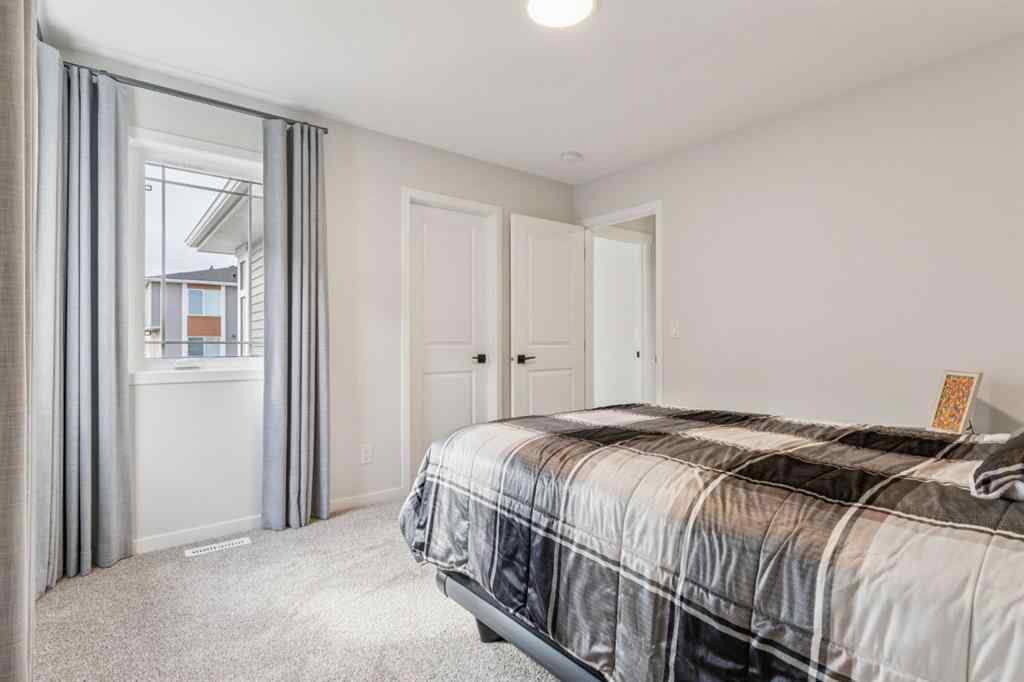 MLS® A2244221 - 335 Creekside Way SW in Pine Creek Calgary, Residential