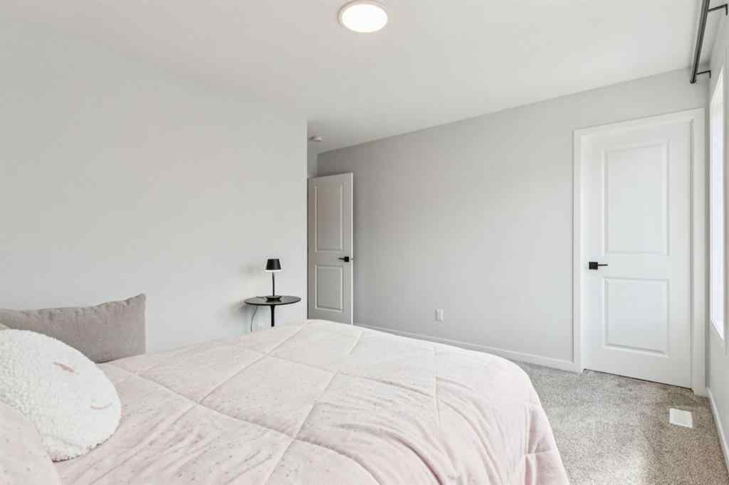 MLS® A2244221 - 335 Creekside Way SW in Pine Creek Calgary, Residential