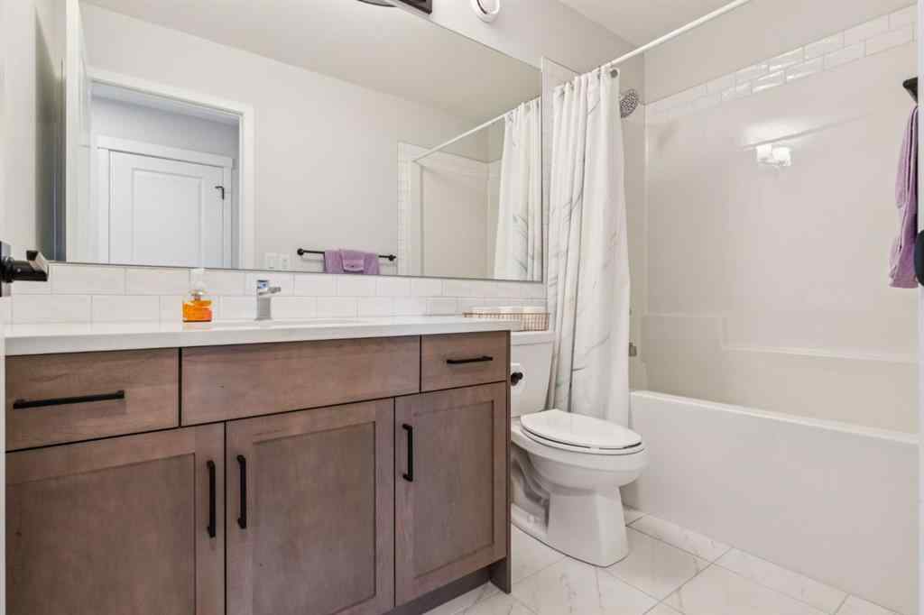 MLS® A2244221 - 335 Creekside Way SW in Pine Creek Calgary, Residential