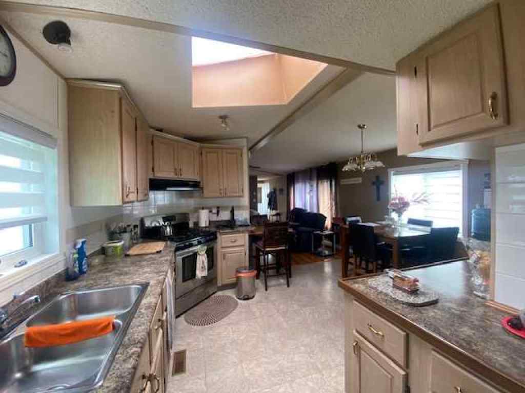 MLS® A2244223 - 30 Lake Stafford Crescent E in North End Brooks, Mobile