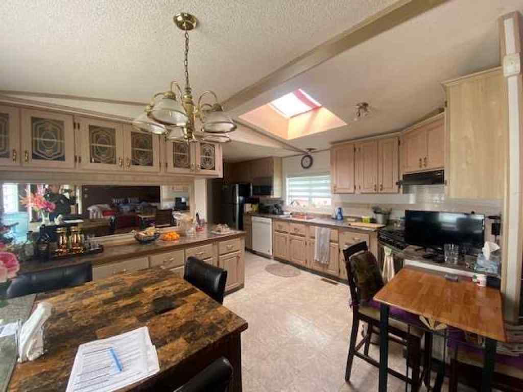 MLS® A2244223 - 30 Lake Stafford Crescent E in North End Brooks, Mobile