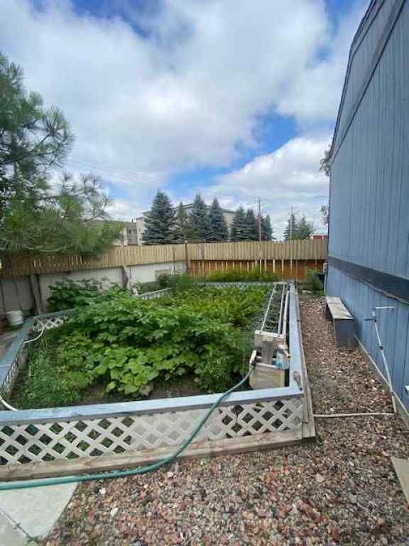 MLS® A2244223 - 30 Lake Stafford Crescent E in North End Brooks, Mobile