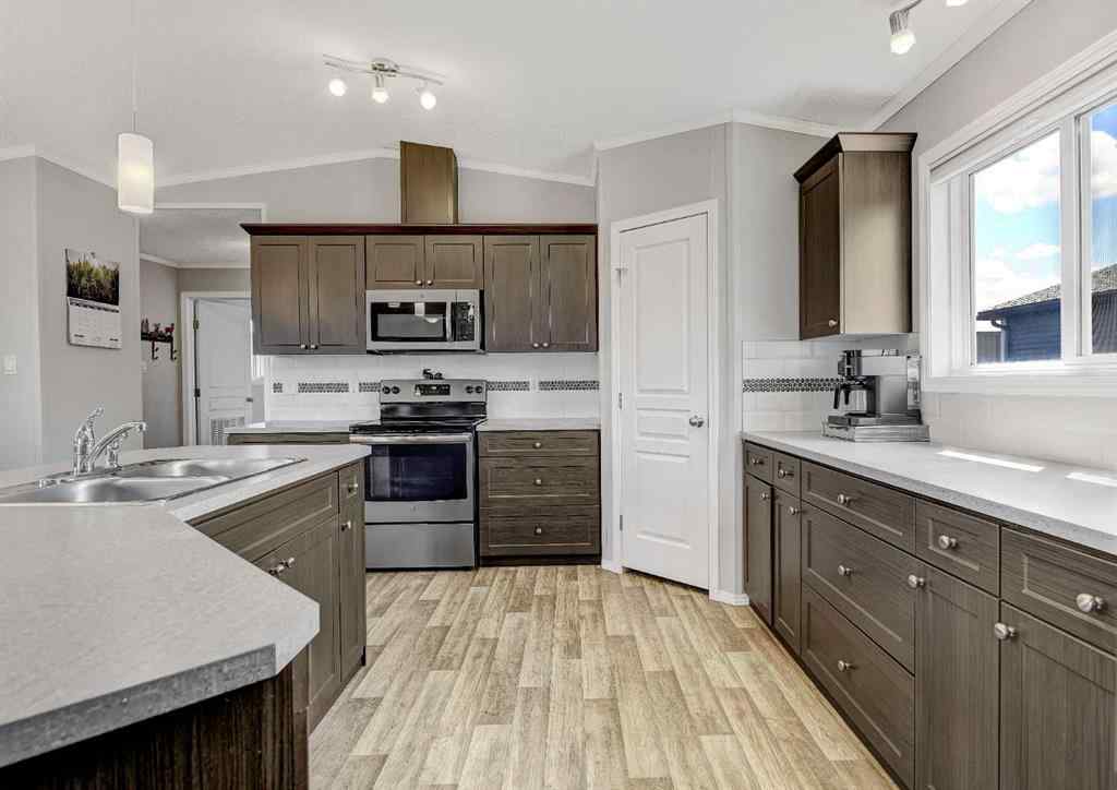 MLS® A2244229 - Unit #105 11850 84 Avenue  in Kensington Grande Prairie, Residential