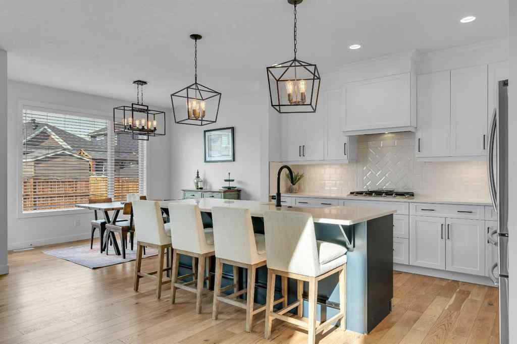 MLS® A2244242 - 2173 Ravensdun Crescent SE in Ravenswood Airdrie, Residential