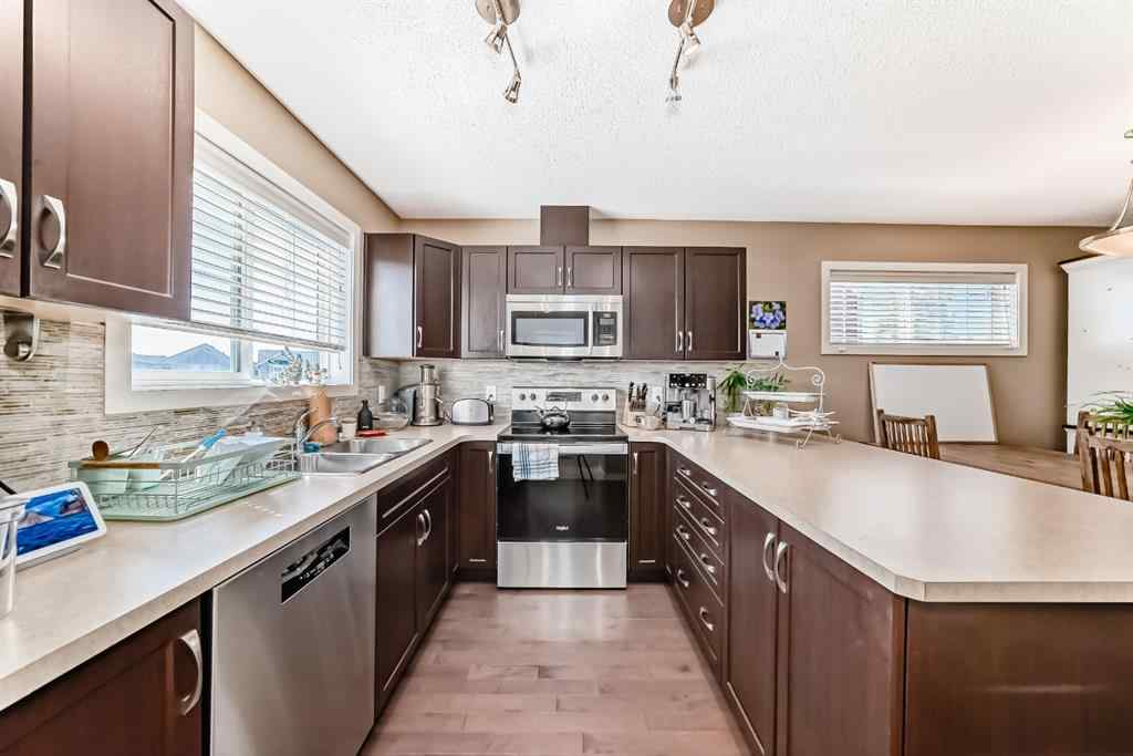 MLS® A2244245 - 44 Sunset Road  in Sunset Ridge Cochrane, Residential