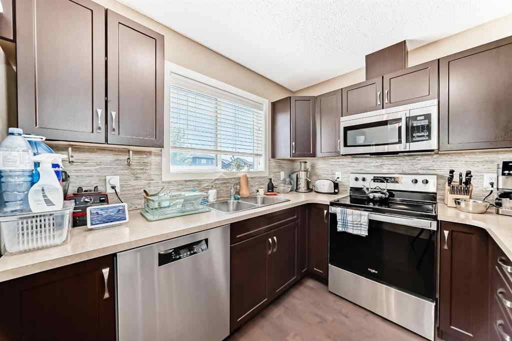 MLS® A2244245 - 44 Sunset Road  in Sunset Ridge Cochrane, Residential