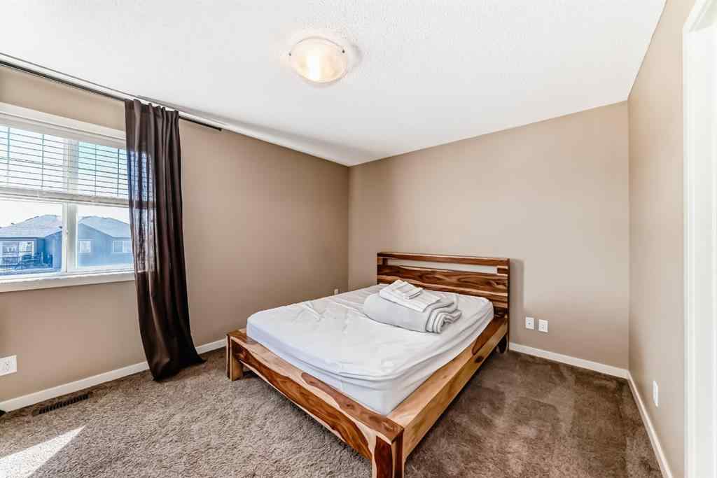 MLS® A2244245 - 44 Sunset Road  in Sunset Ridge Cochrane, Residential
