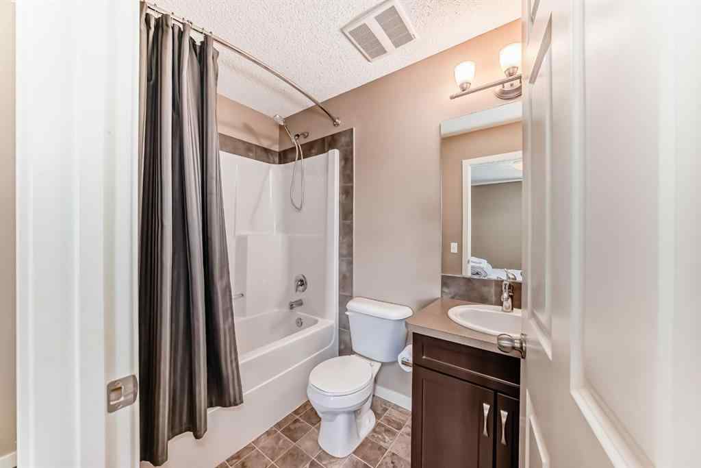 MLS® A2244245 - 44 Sunset Road  in Sunset Ridge Cochrane, Residential
