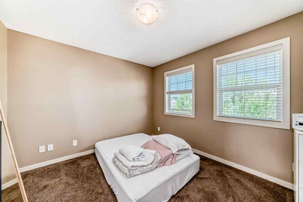 MLS® A2244245 - 44 Sunset Road  in Sunset Ridge Cochrane, Residential