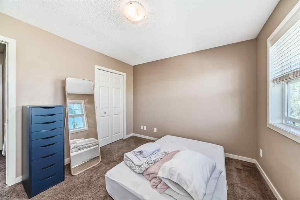 MLS® A2244245 - 44 Sunset Road  in Sunset Ridge Cochrane, Residential