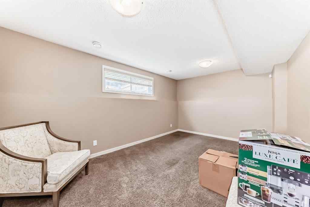 MLS® A2244245 - 44 Sunset Road  in Sunset Ridge Cochrane, Residential