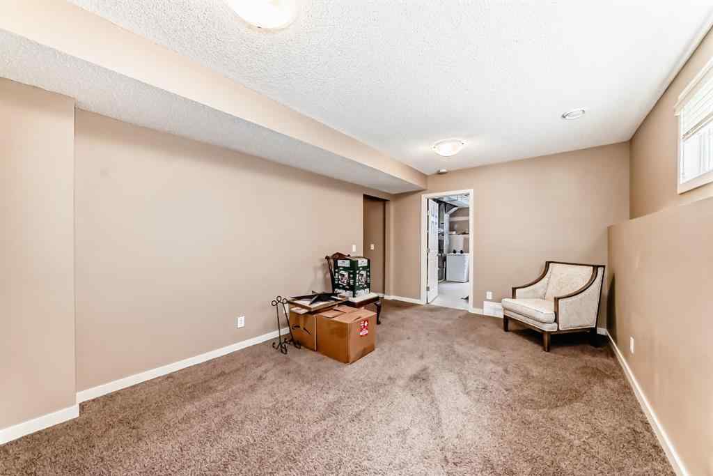MLS® A2244245 - 44 Sunset Road  in Sunset Ridge Cochrane, Residential