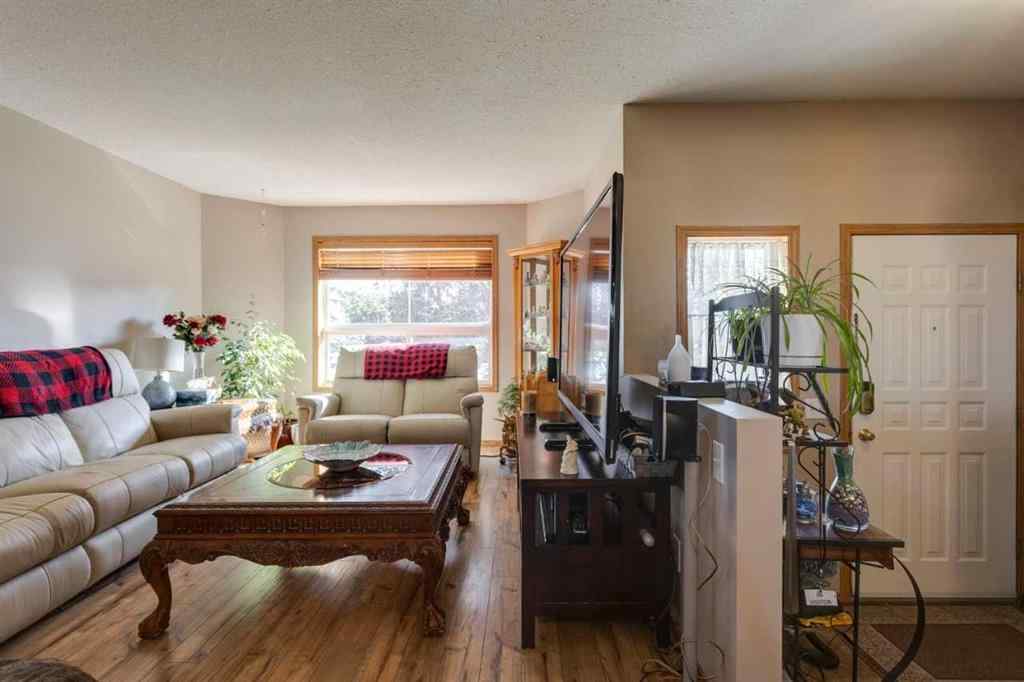 MLS® A2244254 - 87 Coventry Road NE in Coventry Hills Calgary, Residential