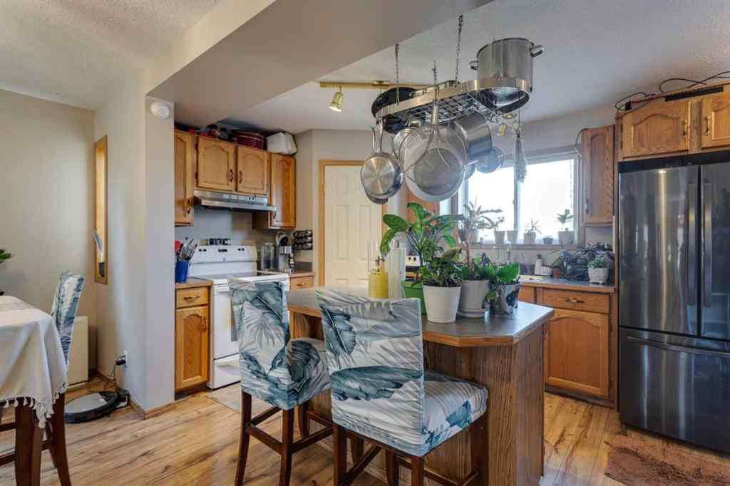 MLS® A2244254 - 87 Coventry Road NE in Coventry Hills Calgary, Residential