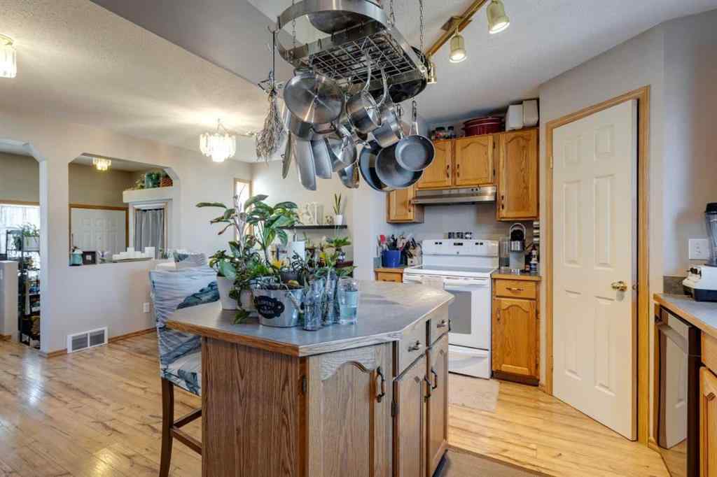 MLS® A2244254 - 87 Coventry Road NE in Coventry Hills Calgary, Residential
