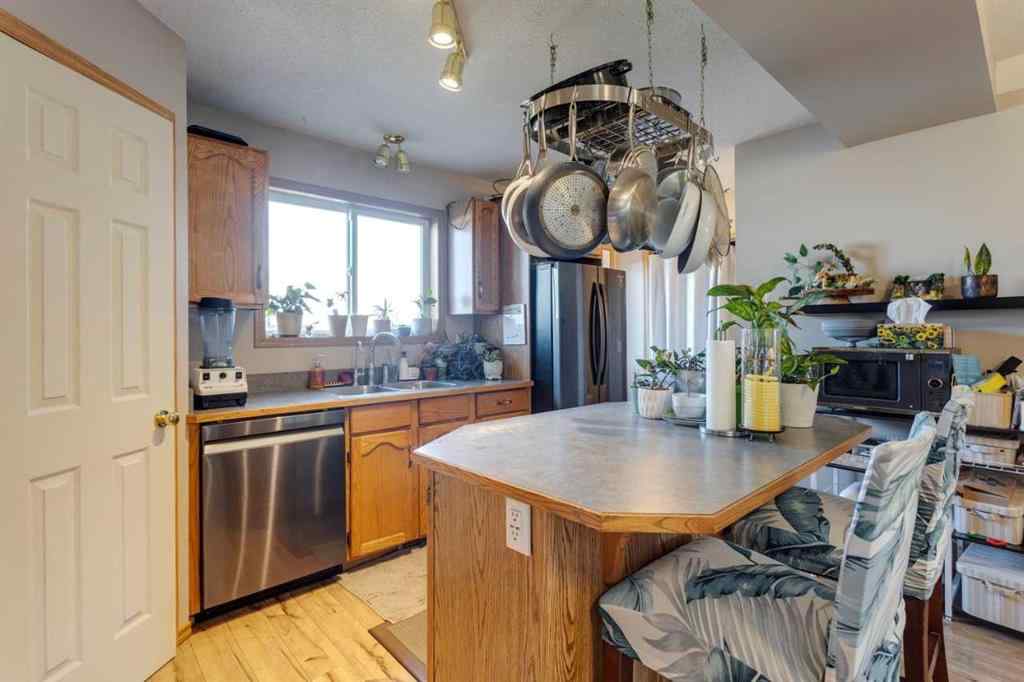 MLS® A2244254 - 87 Coventry Road NE in Coventry Hills Calgary, Residential