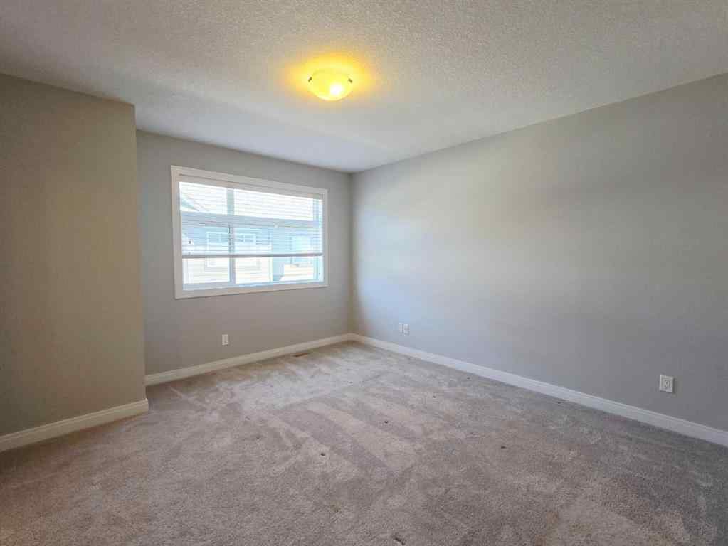 MLS® A2244265 - 120 Wentworth Row SW in West Springs Calgary, Residential