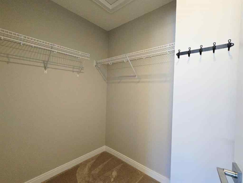 MLS® A2244265 - 120 Wentworth Row SW in West Springs Calgary, Residential