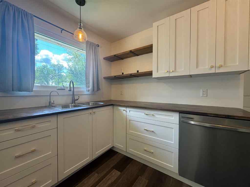 MLS® A2244276 - 5703 47A Avenue  in Mount Pleasant Camrose, Residential