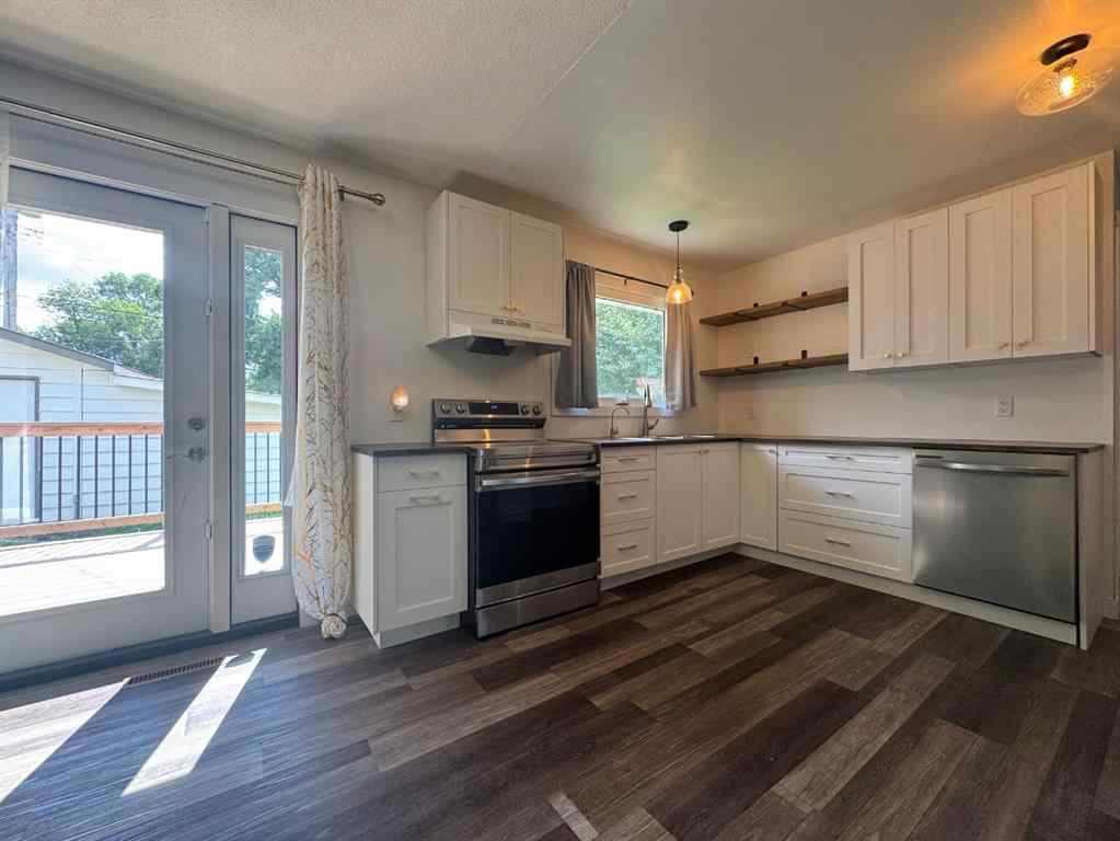 MLS® A2244276 - 5703 47A Avenue  in Mount Pleasant Camrose, Residential
