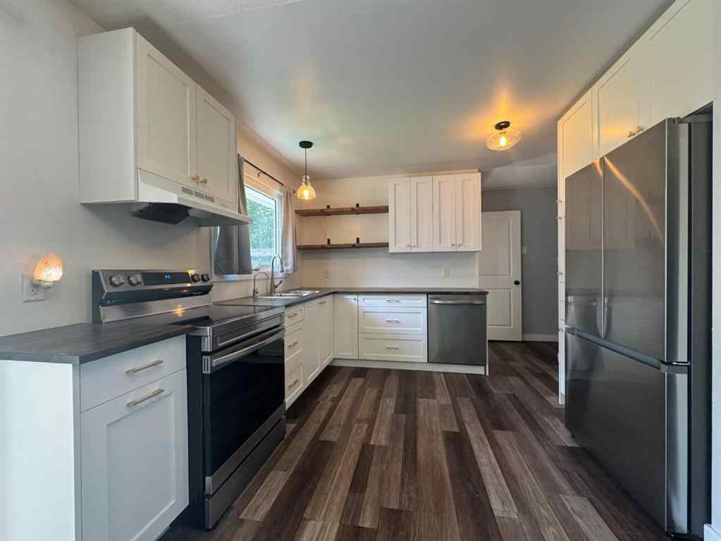 MLS® A2244276 - 5703 47A Avenue  in Mount Pleasant Camrose, Residential
