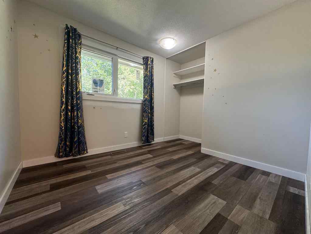 MLS® A2244276 - 5703 47A Avenue  in Mount Pleasant Camrose, Residential
