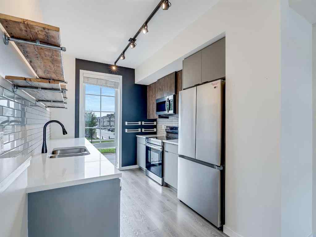 MLS® A2244277 - 2450 210 Avenue SE in Walden Calgary, Residential