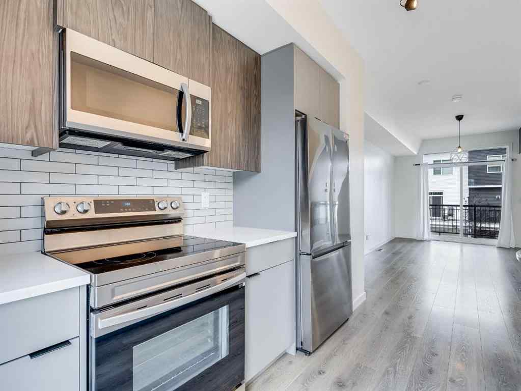 MLS® A2244277 - 2450 210 Avenue SE in Walden Calgary, Residential