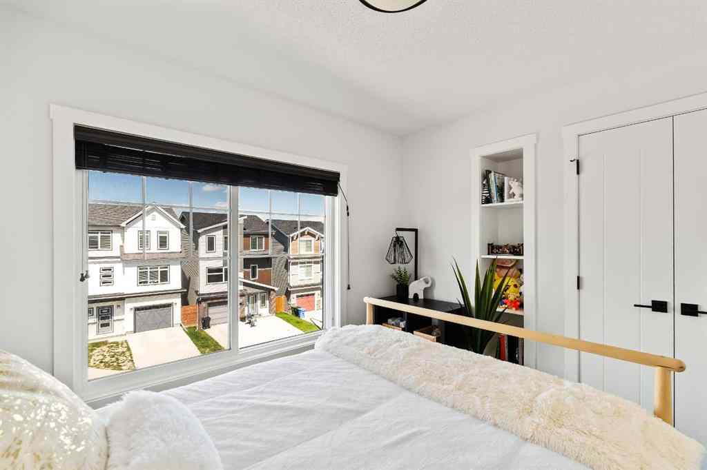 MLS® A2244317 - 233 Lucas Manor NW in Livingston Calgary, Residential